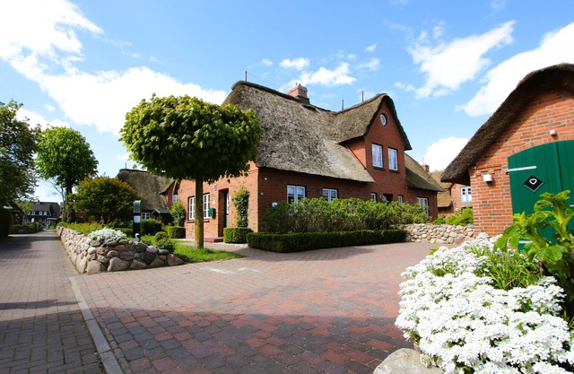 Haushälfte in Wrixum Unter Reetdach mit 3- Zimmern und 90 qm