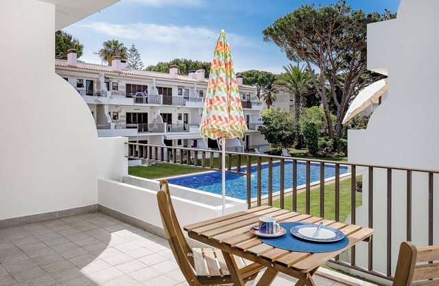 Holiday Apartment 'Moura Mar' with Shared Pool, Shared Garden & Wi-Fi