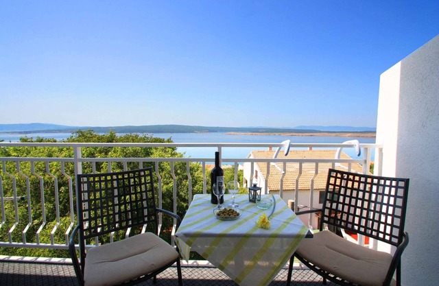 Holiday apartment with balcony and air conditioning