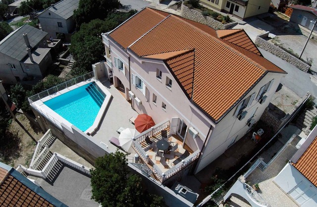Holiday apartment with garden and pool