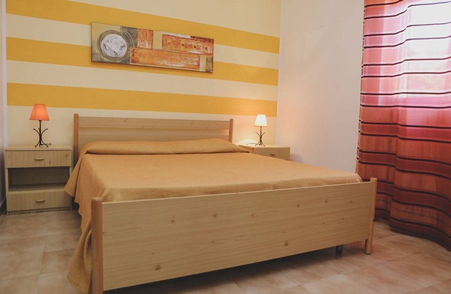 Holiday Home 'Residence Le Magnolie 5 - Piano T' with Sea View, Wi-Fi and Air Conditioning