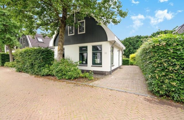 Holiday home with 2 bedrooms, Sunshower, sauna and spacious garden