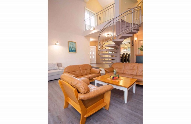 Holiday home with terrace and sea view