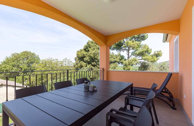 Holiday home with terrace and barbecue