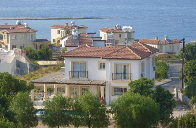Holiday villa with a view of the water