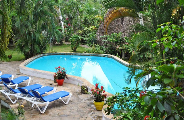 Hostel room with shared bathroom on tropical lagoon