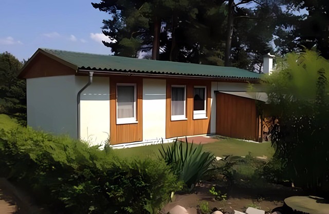 House 1 with fireplace and rowing boat