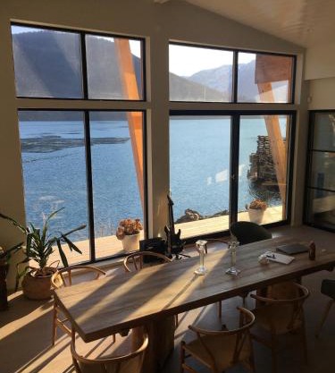 House by the fjord with amazing view