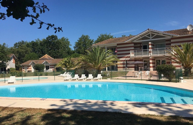 House in holiday residence with swimming pool