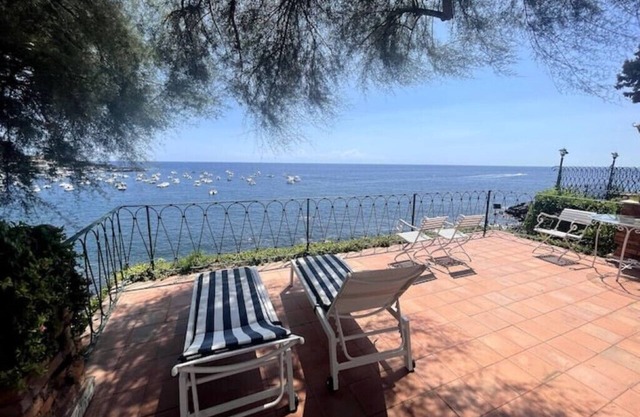 House with garden on the sea