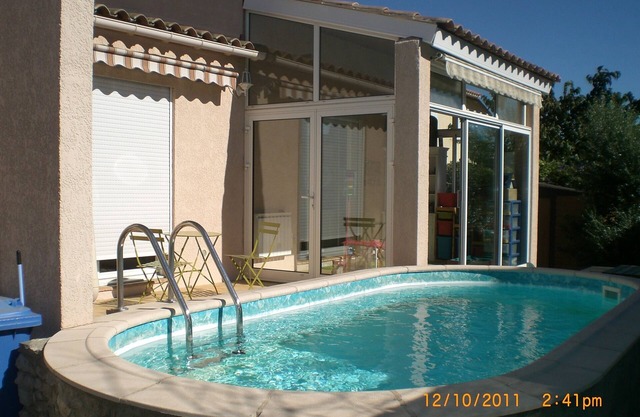 House with pool in residential area