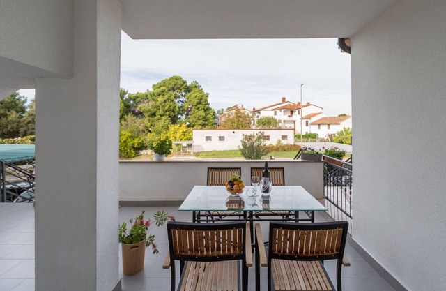 Idyllic flat just 600 metres from the beach with private terrace, WiFi, parking space