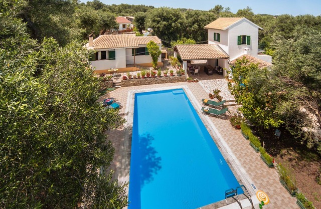 Indulge in Peace: A Paxos Sanctuary by the Olive Groves.