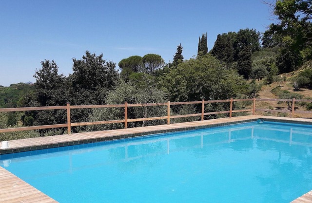 Inviting holiday home with swimming pool
