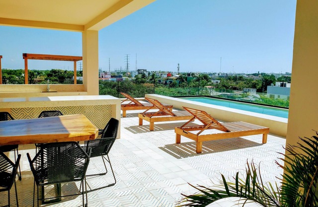 Kaab AtP new Apt with rooftop pool, cozy.