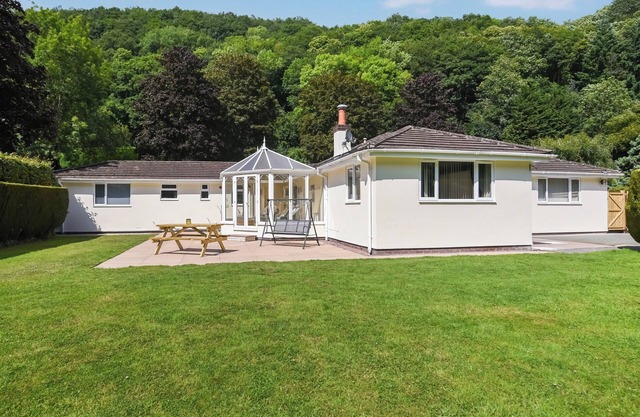 Kick back and relax at this lovely riverside house in Montgomeryshire, Powys.