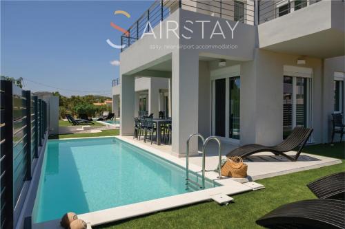 Komos Villas Airport by Airstay