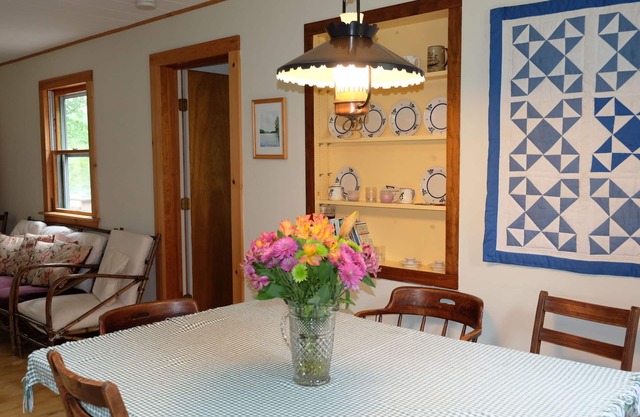 LAKEFRONT LOG CABIN ON SEAL COVE POND IN TREMONT OVERLOOKING MOUNTAINS OF ACADIA