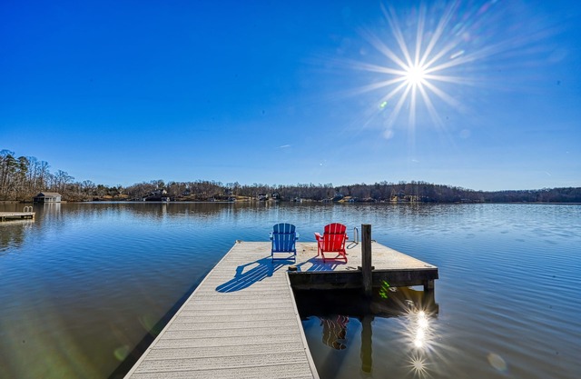 Lakeside retreat with a firepit, dock, sprawling deck, pool table - dog friendly