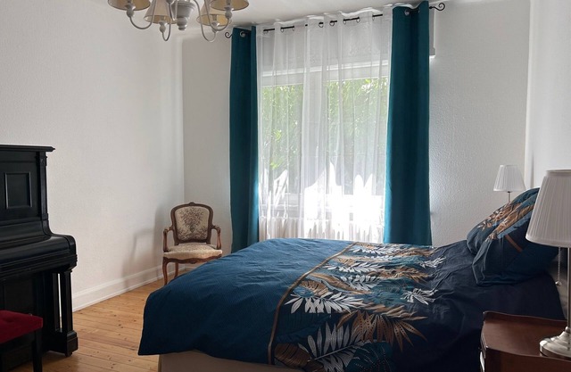 Large apartment 300m from Passerelle des 3 Pays, with balcony, garden, quiet location