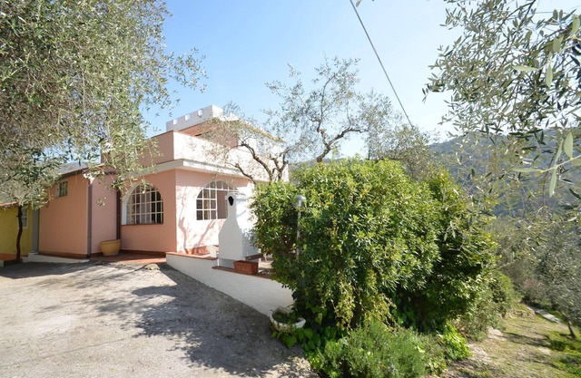 Light-flooded holiday home with three terraces and communal pool