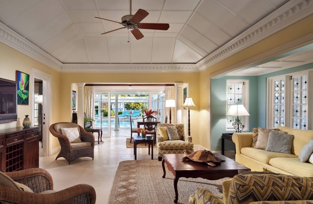 Located in Founders Cove | Living room Balcony or patio | Semi-private pool