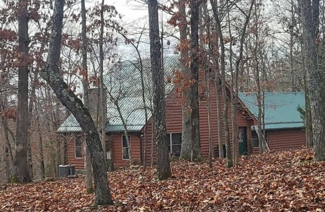 Log cabin on 9 acres. Perfect for a winter retreat or summer trip to the river.