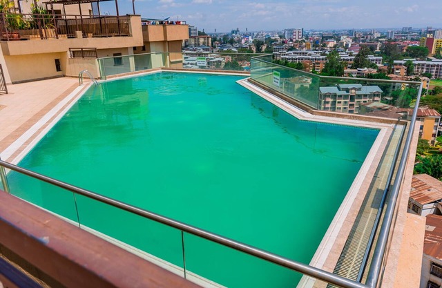 Lovely two bedroom space with rooftop outdoor pool and terrace with scenic views