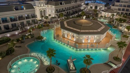 Luxury 1BR Lagoon View Arjan near Miracle Garden Vincitore Benessere by Green Sky Holiday Homes