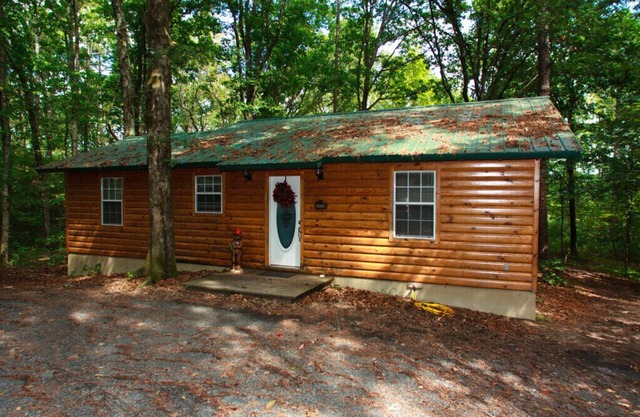 Luxury cabin with hot tub, ATV trails, and secluded in the woods