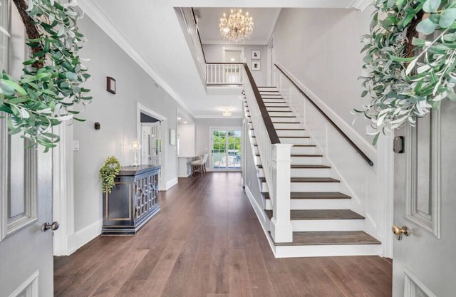 Luxury lakefront living w/dock, pub, game rm