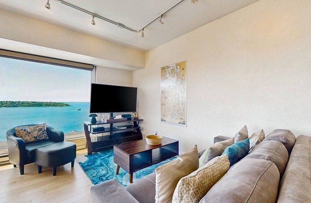 Luxury suite with fitness center, features shared pool and hot tub