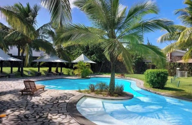 luxury two-bedroom apartment in a secured residence 3 minutes walk to the beach