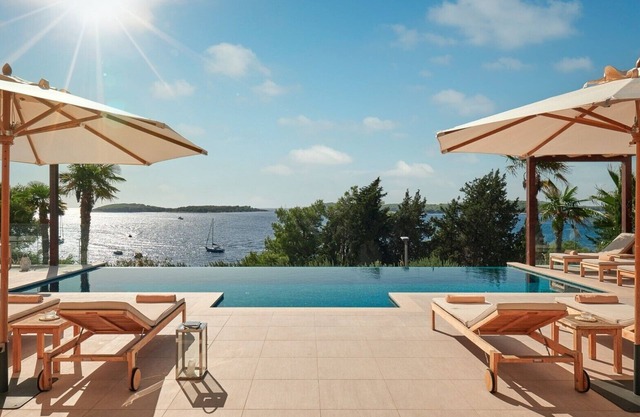 Luxury Villa Hvar Deluxe Palace I with private heated pool and sauna by the beach at island of Hvar