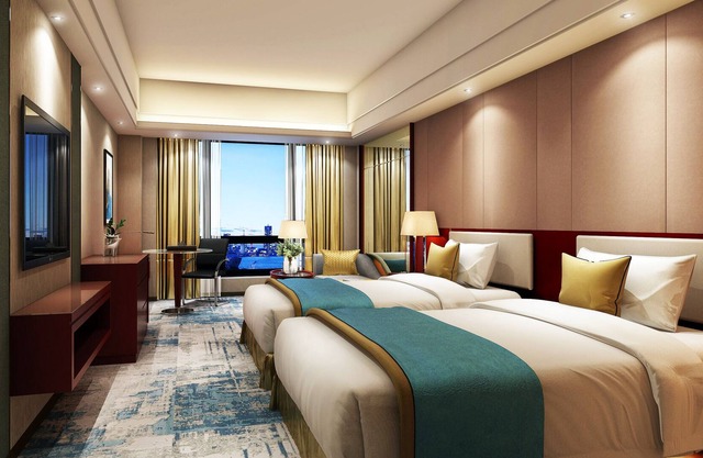 Manhattan Kinlen Hotel - Shishi