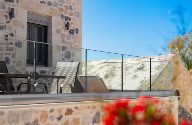 Marilena natural stone house