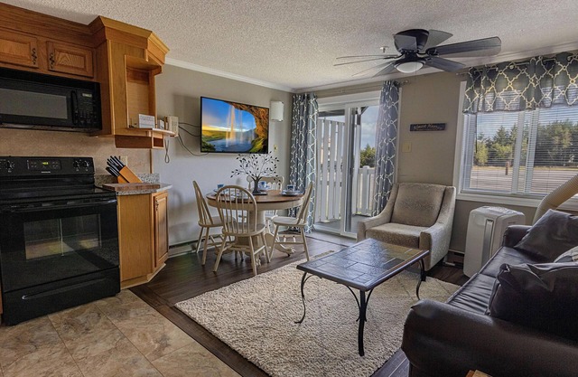 ML 109-Enjoy summer in this inviting bike-in/out 1BR with brand new deck!
