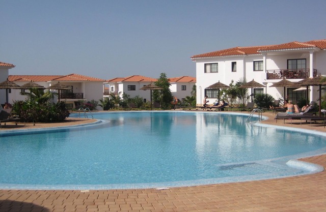 Modern 2 bedroom apartment & balcony. Well kept resort, newly painted.