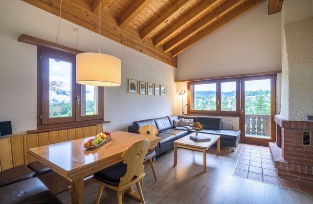 Modern 3.5 - room penthouse apartment in Flims village.