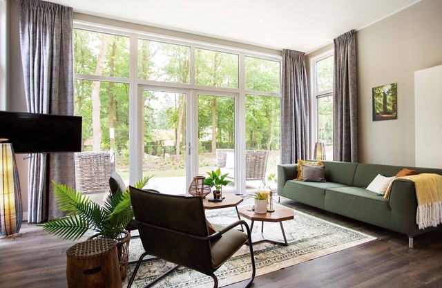 Modern chalet with spa and sauna in Beekbergen