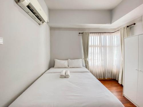 Modern & Gorgeous 2BR Apartment at Newton Residence By Travelio