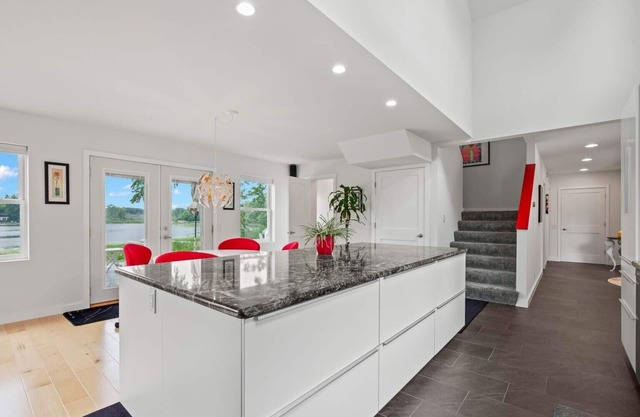 Modern lake house with a double lot. The views are amazing inside and out!n