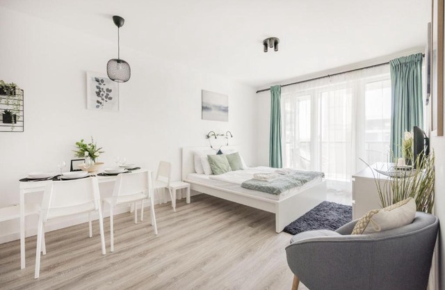 Modern Riverfront Apartment with Free Parking