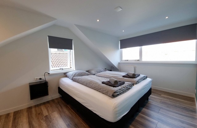 Modern styled holiday home at the base of the dunes, nearby beach and sea!