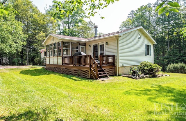 "Mulrooney's" is a ranch style home offering everything on the main level in Lake Mokoma