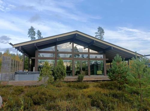 Naava Resort Luppo - Upea huvila ulkoporealtaalla sekä järvinäkymällä