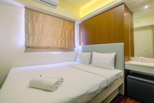 New Furnished and Minimalist 3BR at Meikarta Apartment By Travelio