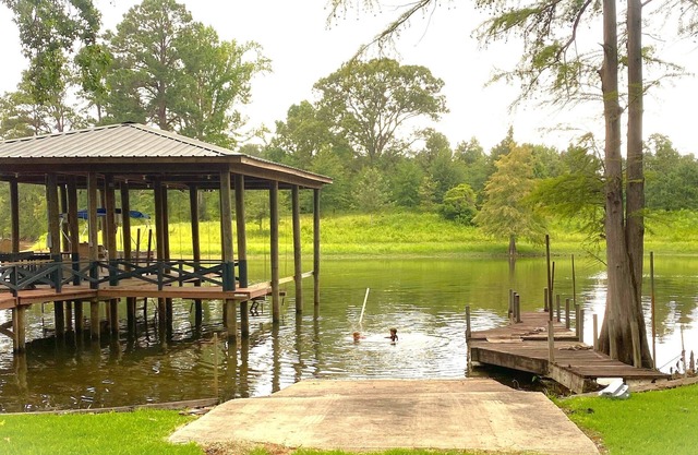 Newly Renovated Lakefront home with boat house, launch and 2 piers!