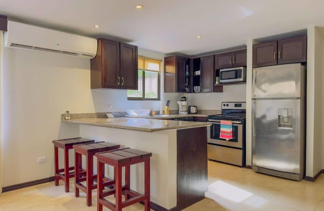 Newly Updated 1-bedroom condo in laid back Playa Ocotal with AC, WiFi, King Bed