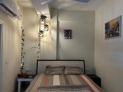 Nivaas Cozy 1BHK Stay near Airport Road
